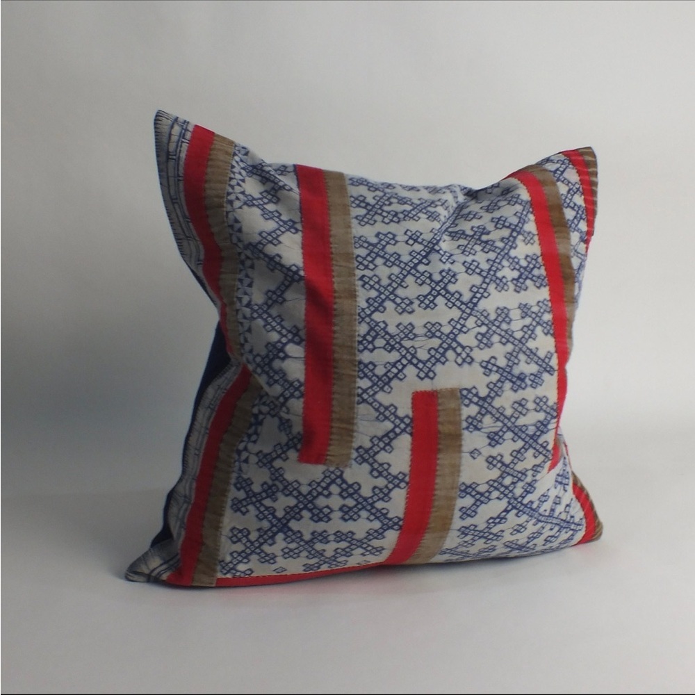 Elegant Red and Blue Patterned Pillow